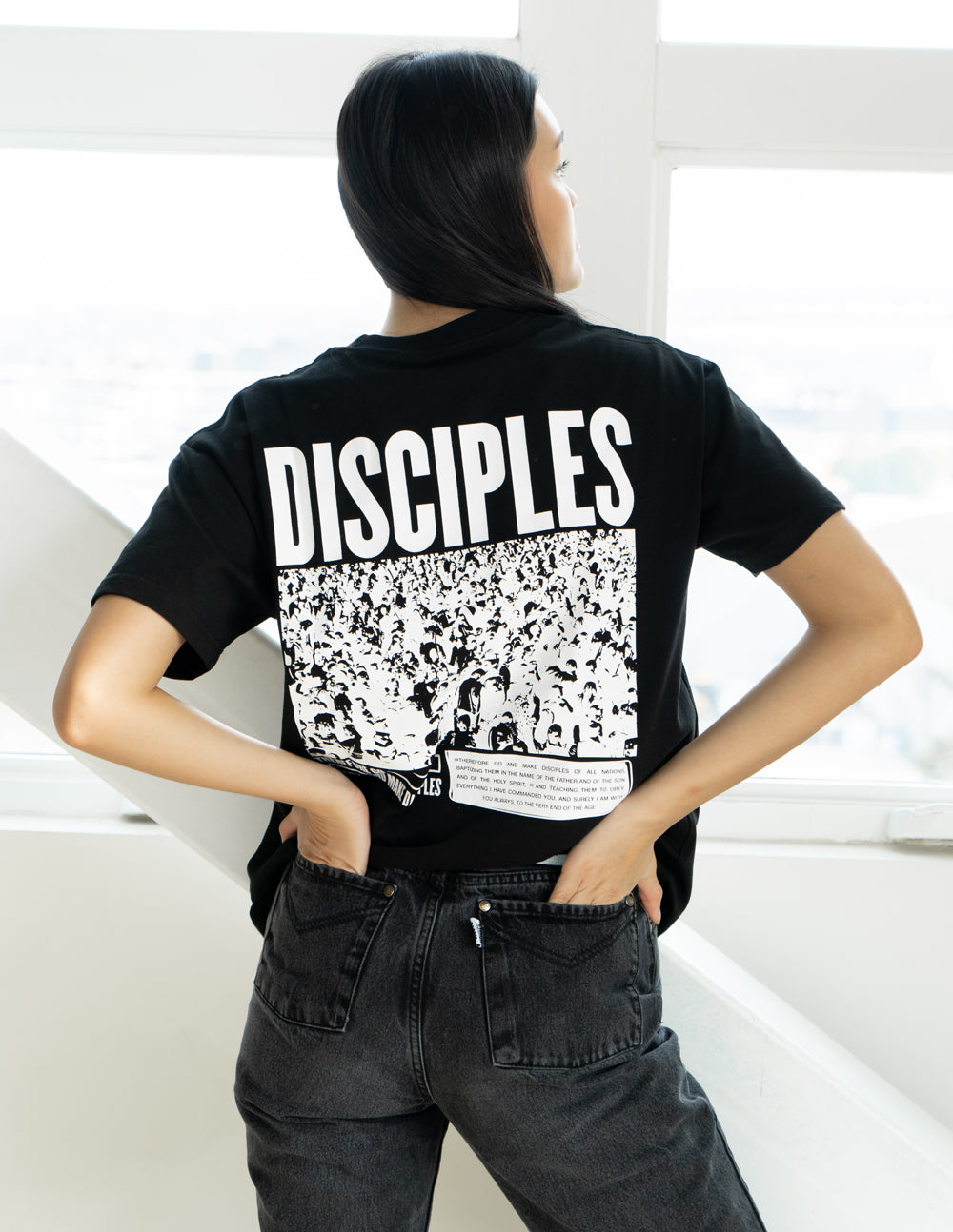 Unisex T-shirt, black, with large white DISCIPLES back graphic and photo-style print