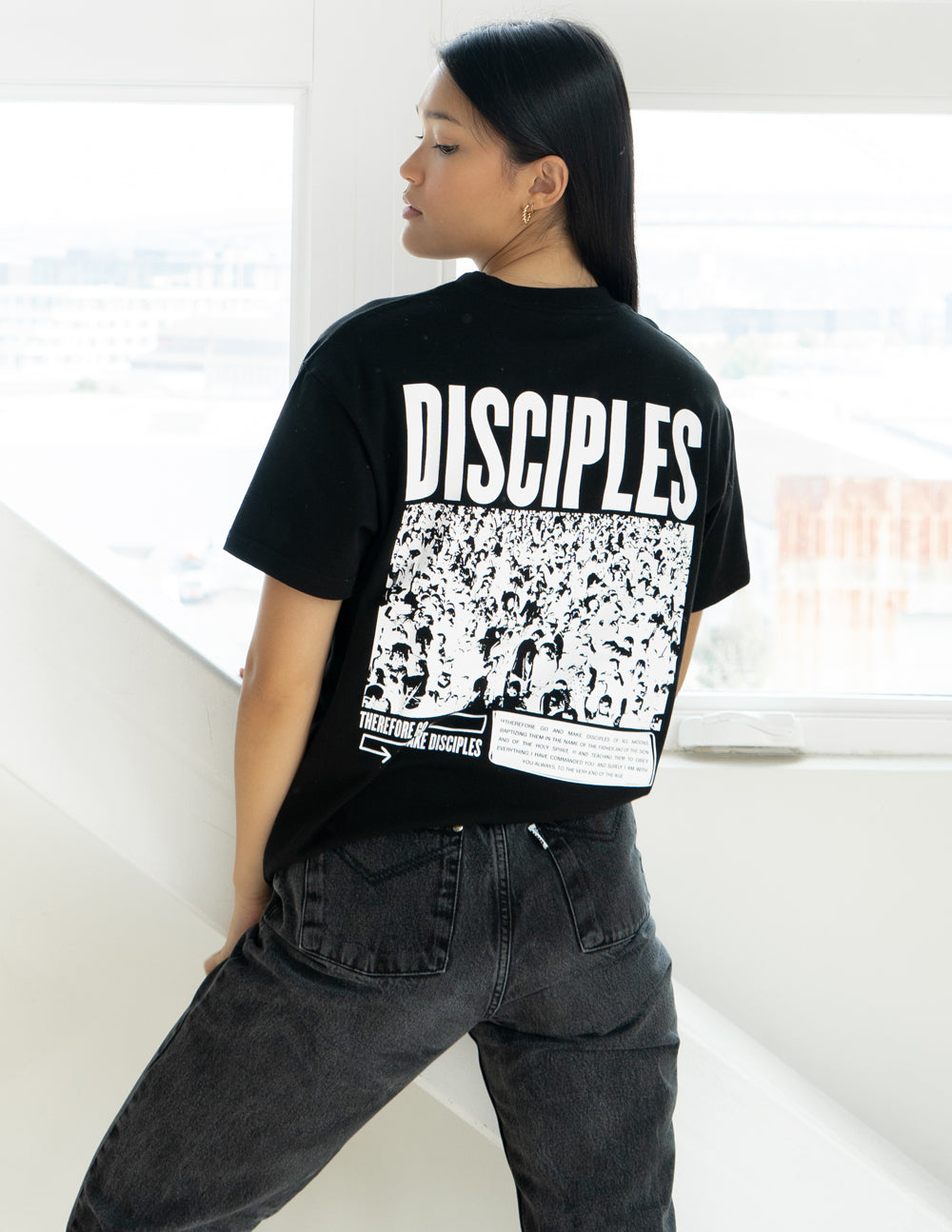 Unisex T-shirt, black, with large white DISCIPLES back graphic and photo-style print