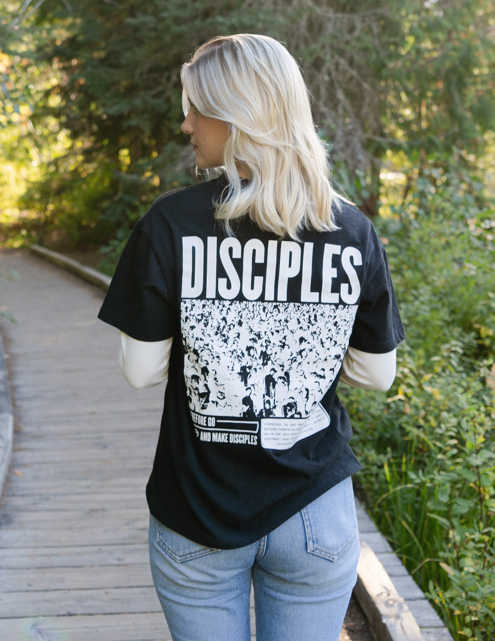 Unisex T-shirt, black, with large white DISCIPLES back graphic and photo-style print
