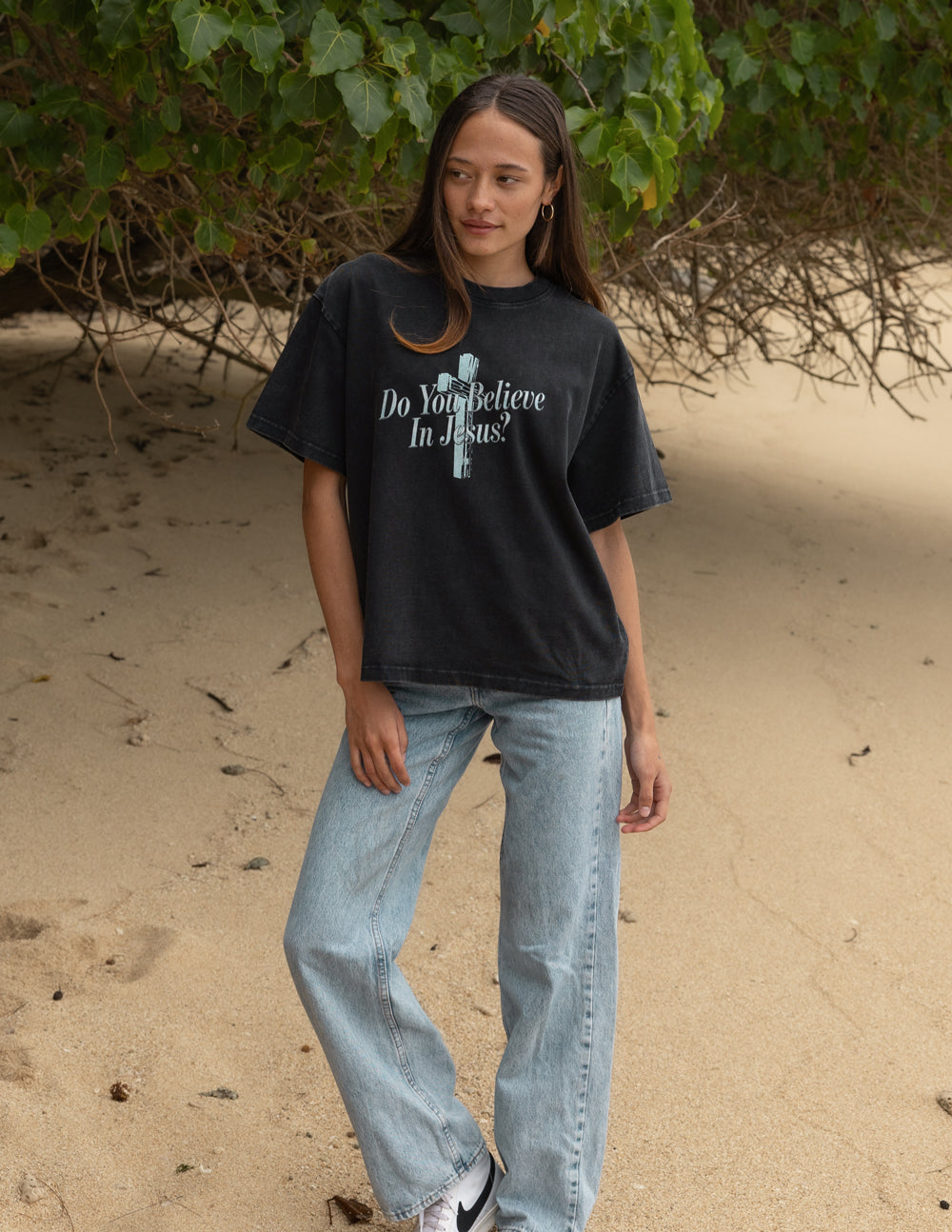 Black crewneck tee with short sleeves, front cross graphic, and “Do You Believe In Jesus?”.