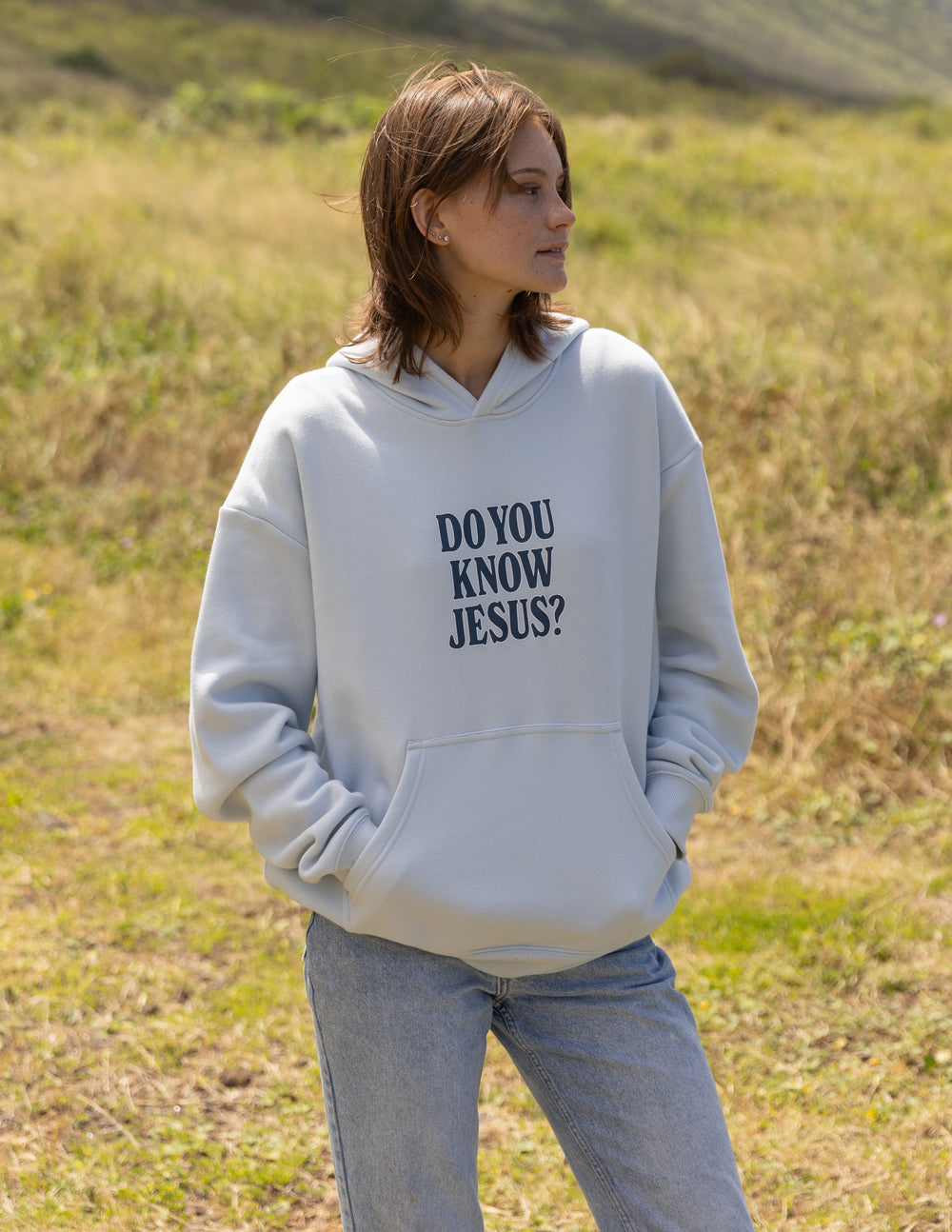 Light gray unisex hoodie with front 'DO YOU KNOW JESUS?' graphic and hood