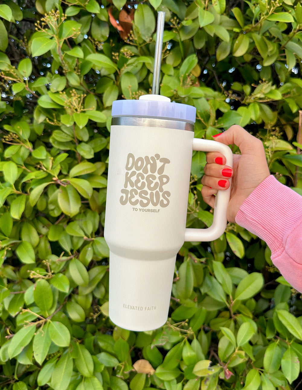 Cream tumbler with silver lid and straw, 'Don't Keep Jesus to Yourself' front