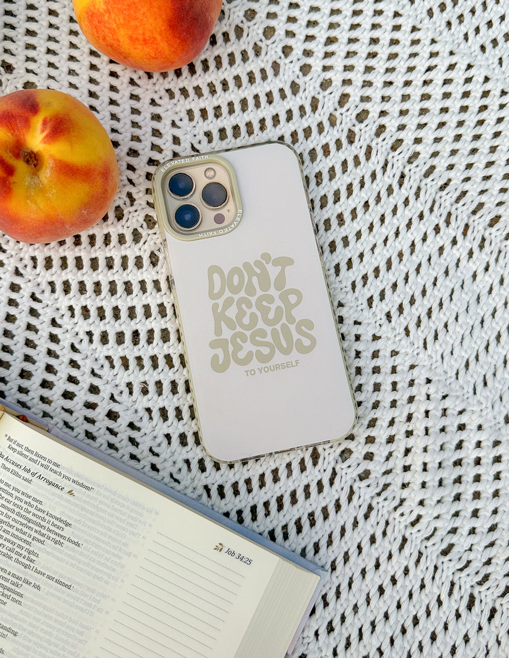 White phone case with "Don't Keep Jesus to Yourself" text and triple-camera cutout