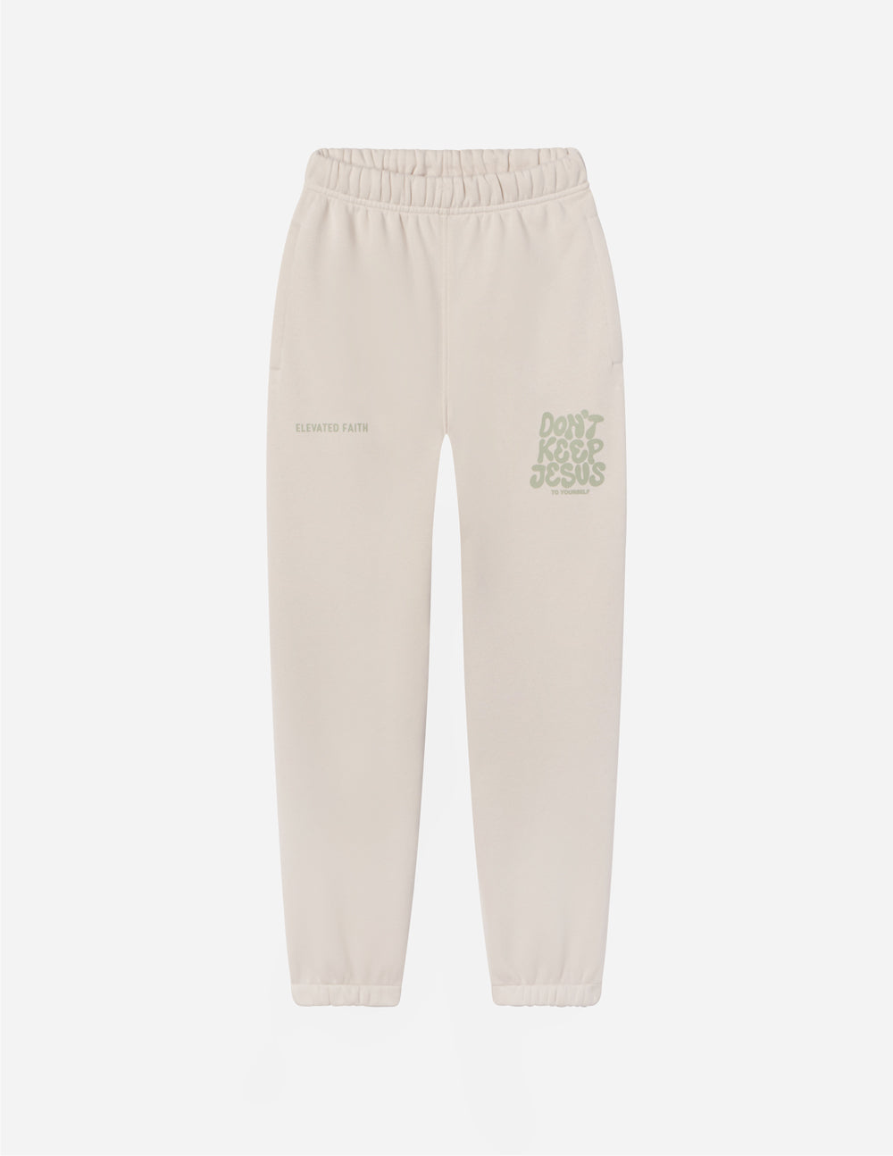 Cream unisex sweatpants flat lay with green logo print and elastic waist