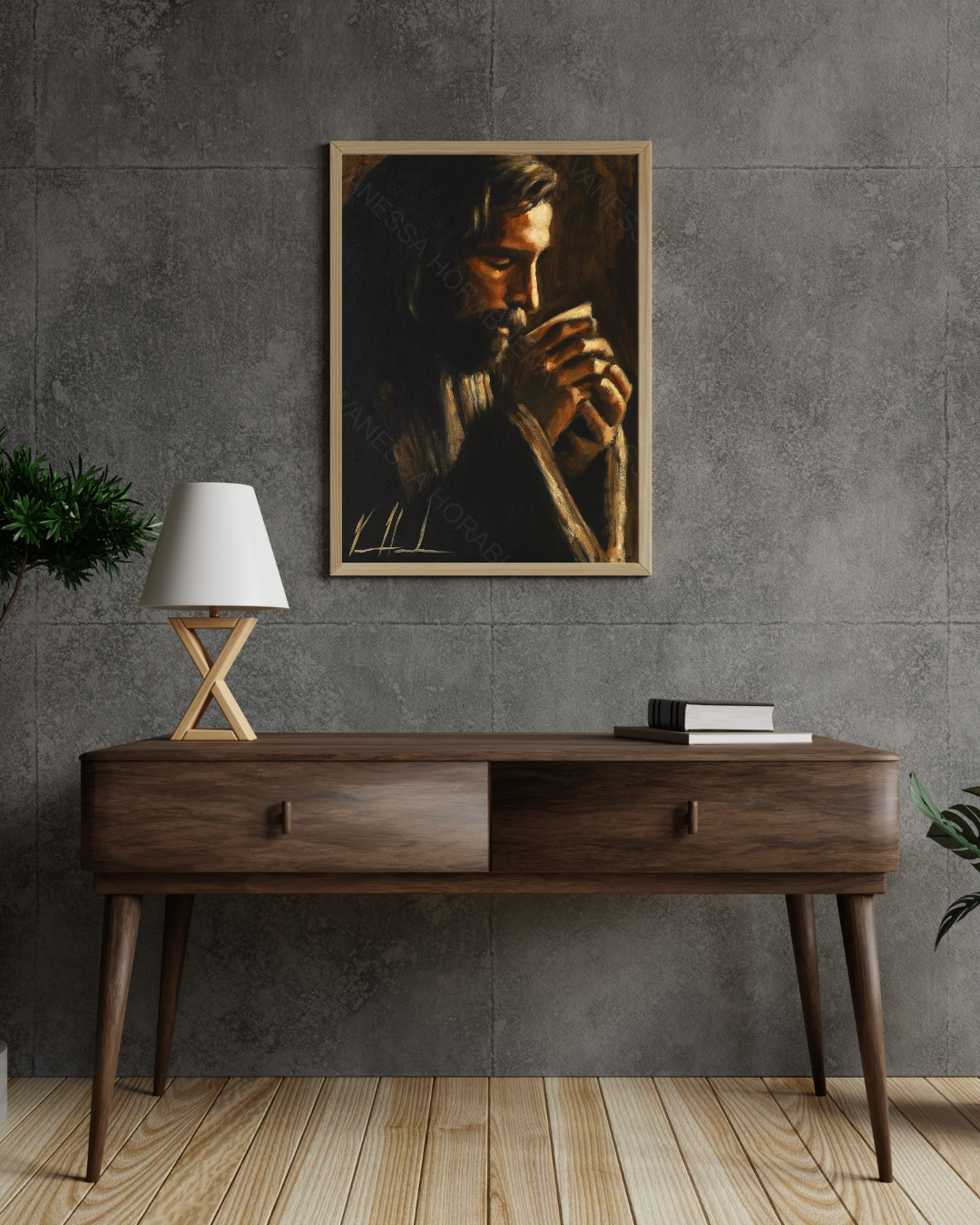 Framed portrait artwork of a man holding a cup, dark tones with warm amber light