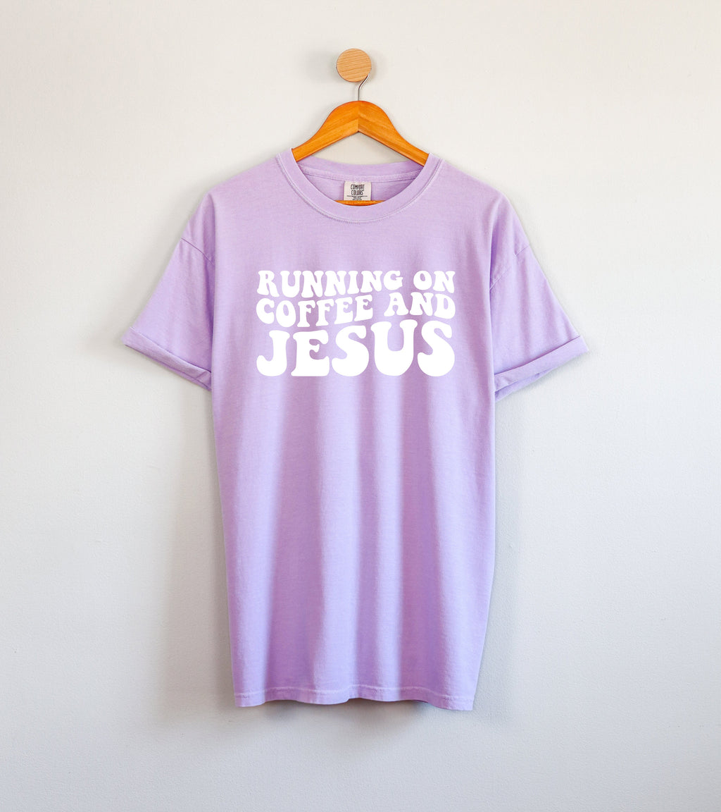 Orchid Christian graphic t-shirt with Running on Coffee and Jesus lettering