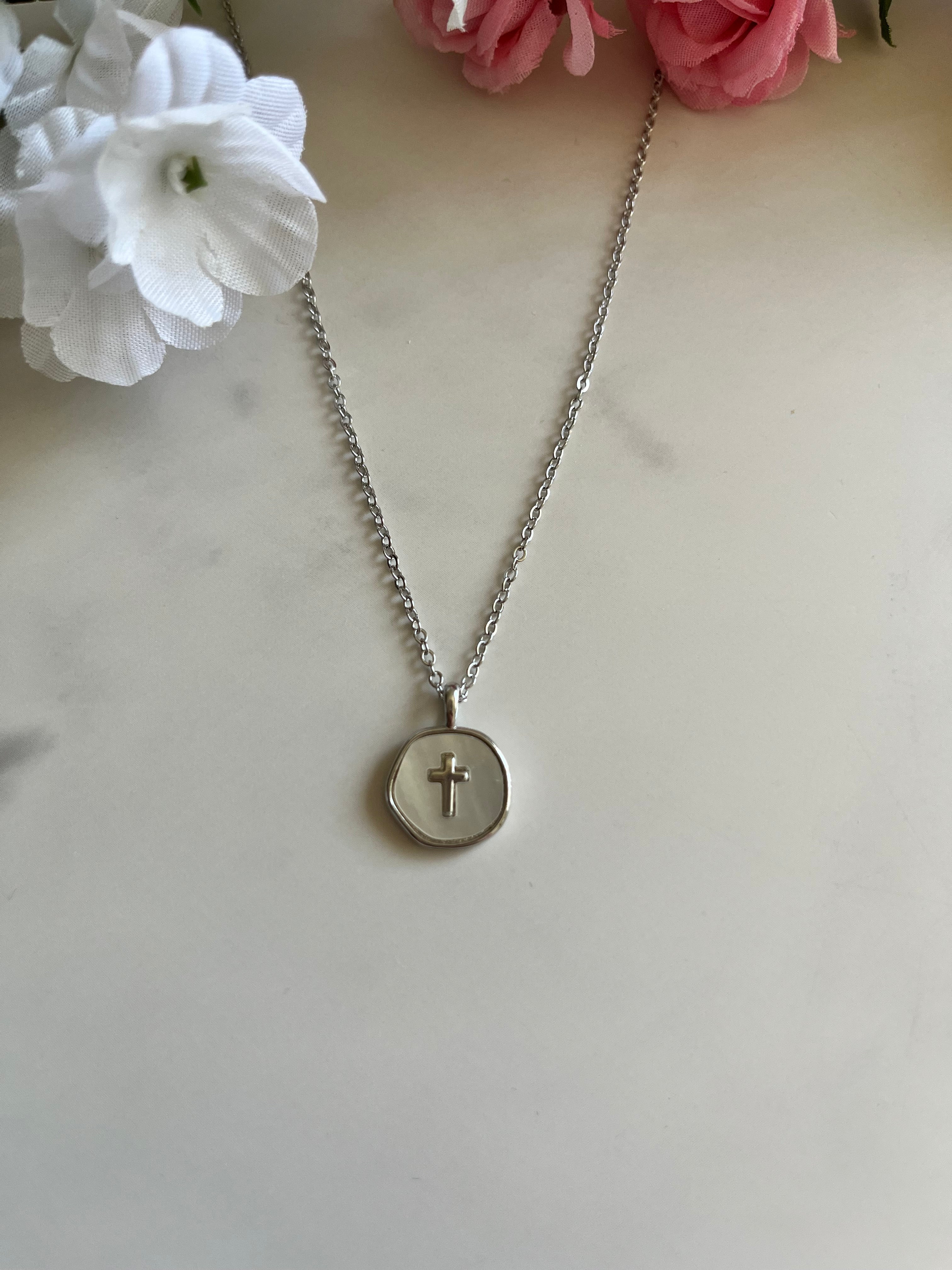 Silver cross pendant necklace with round disc charm and small chain