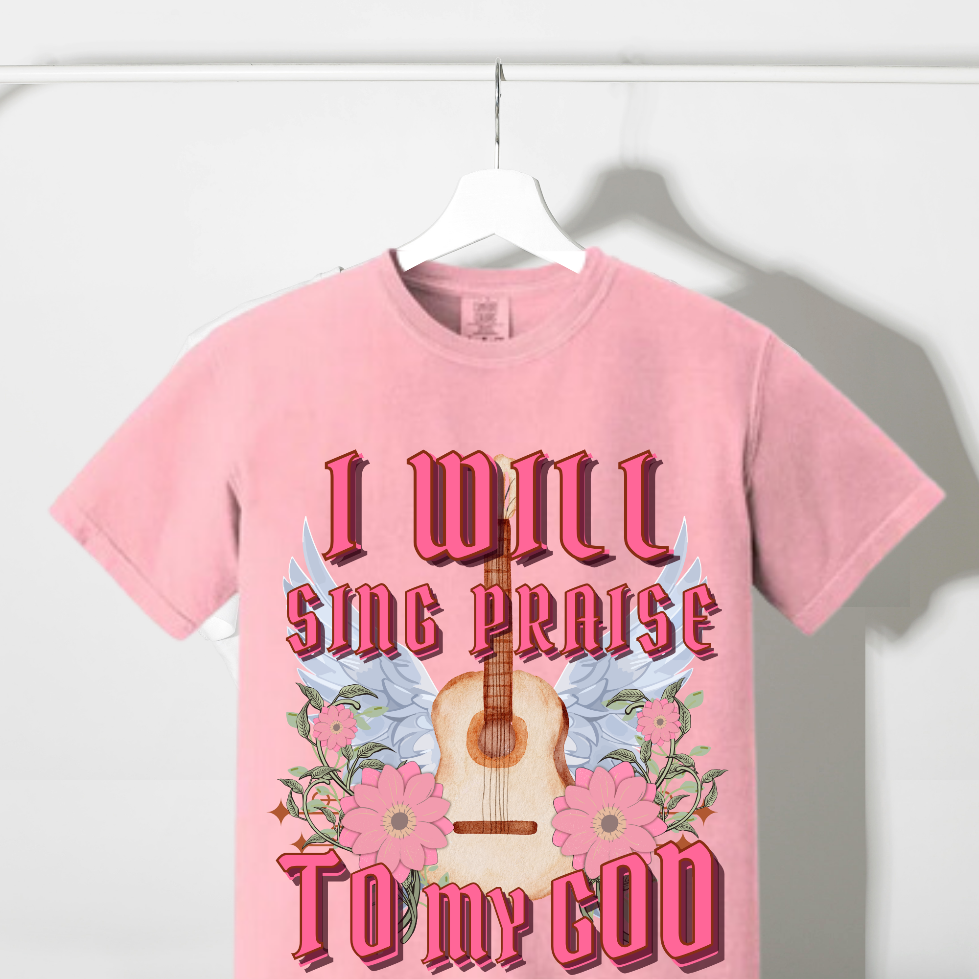 Comfort Colors pink T-shirt with front text 'I will sing praise' and guitar graphic