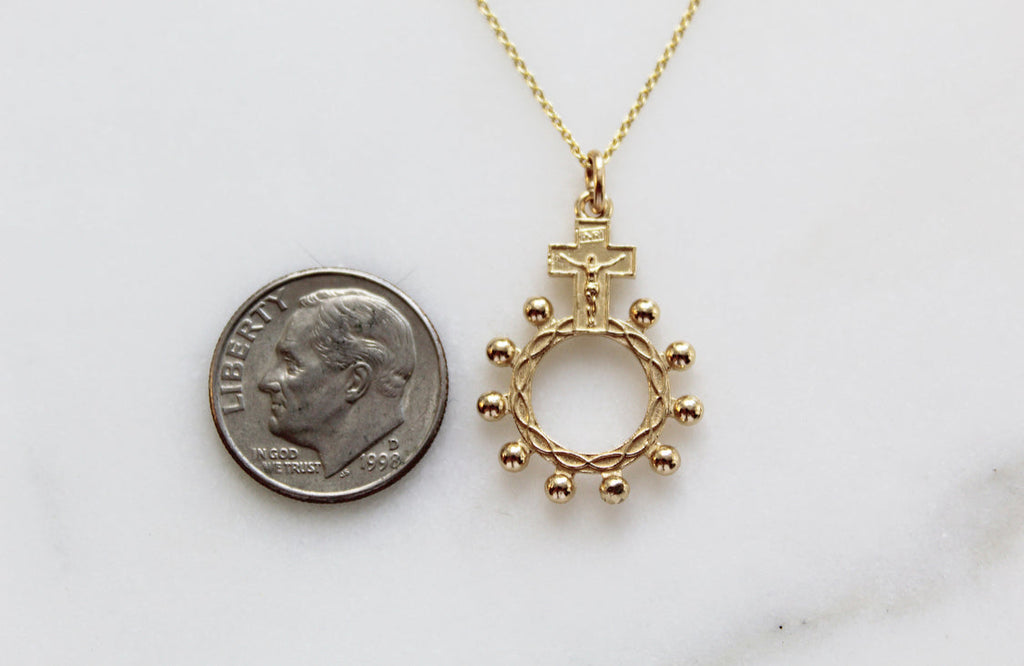 14k gold rosary bead necklace pendant with cross top and circular bead halo ring
