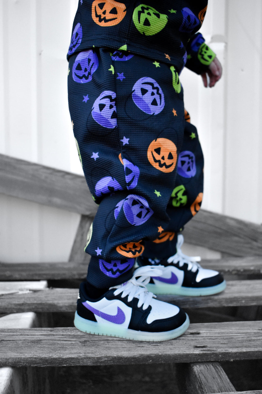 Dark navy kids waffle pajama pants with Halloween pumpkin and ghost allover print