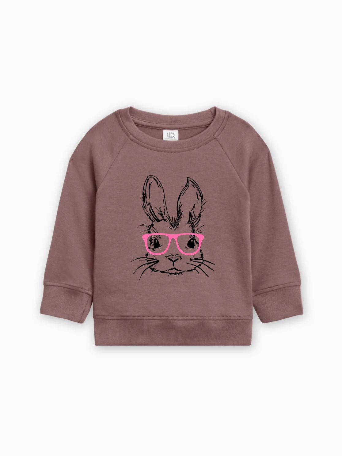 Organic cotton baby pullover in dusty mauve with bunny face graphic and pink glasses