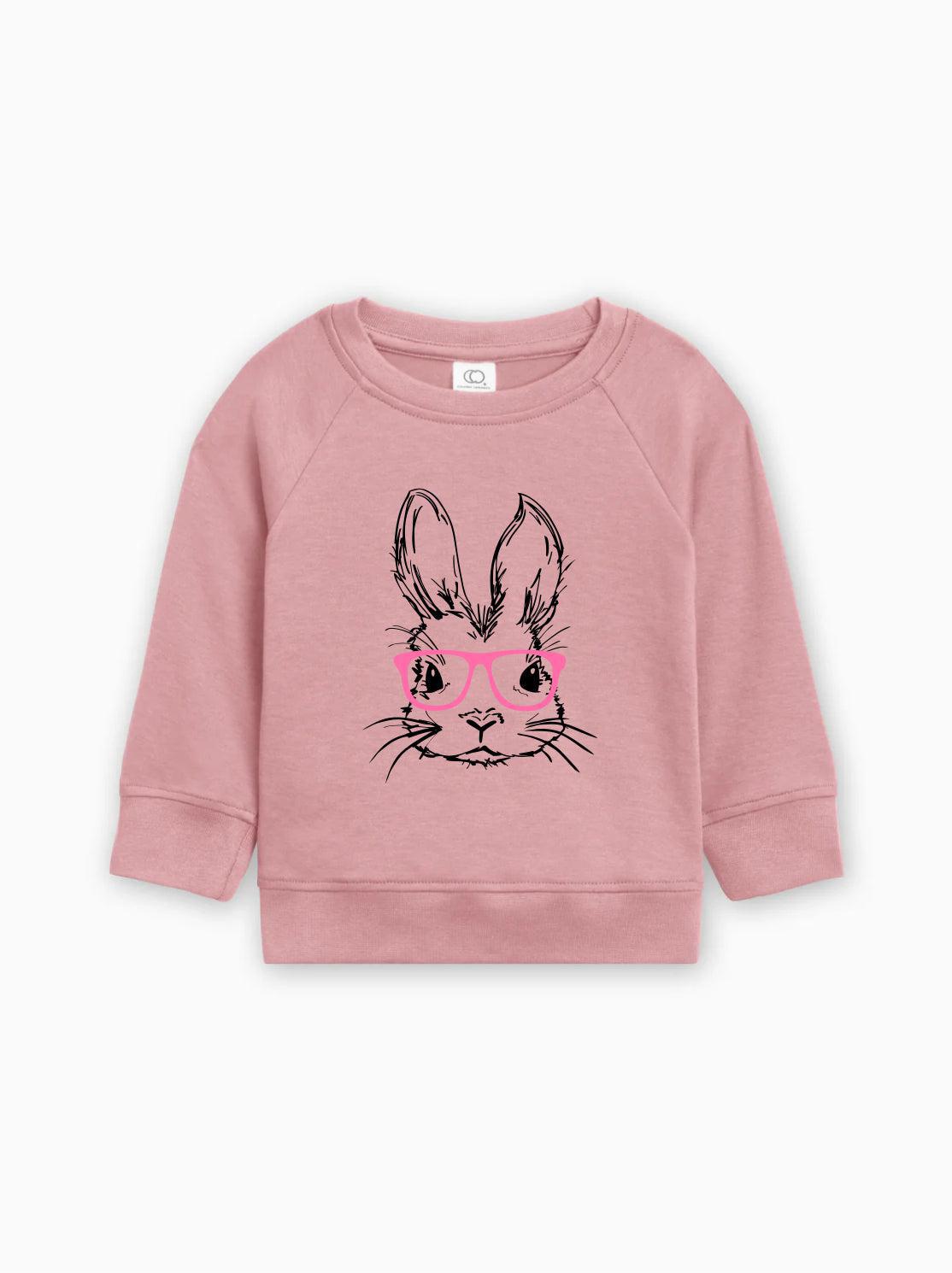 Organic cotton baby pullover in rose pink with bunny face graphic and pink glasses