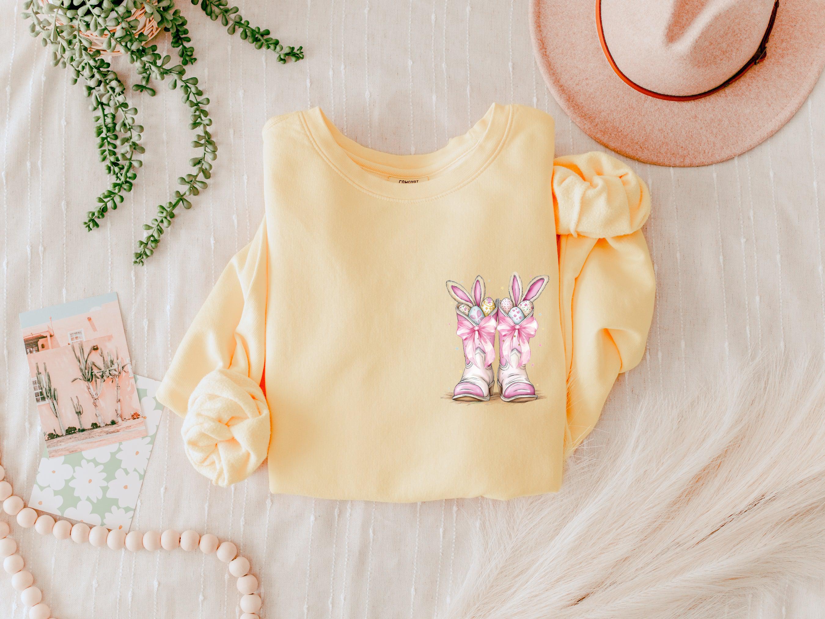 Butter yellow crewneck sweatshirt with Easter bunny and egg graphic