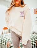 Ivory crewneck sweatshirt with Easter bunny and egg graphic