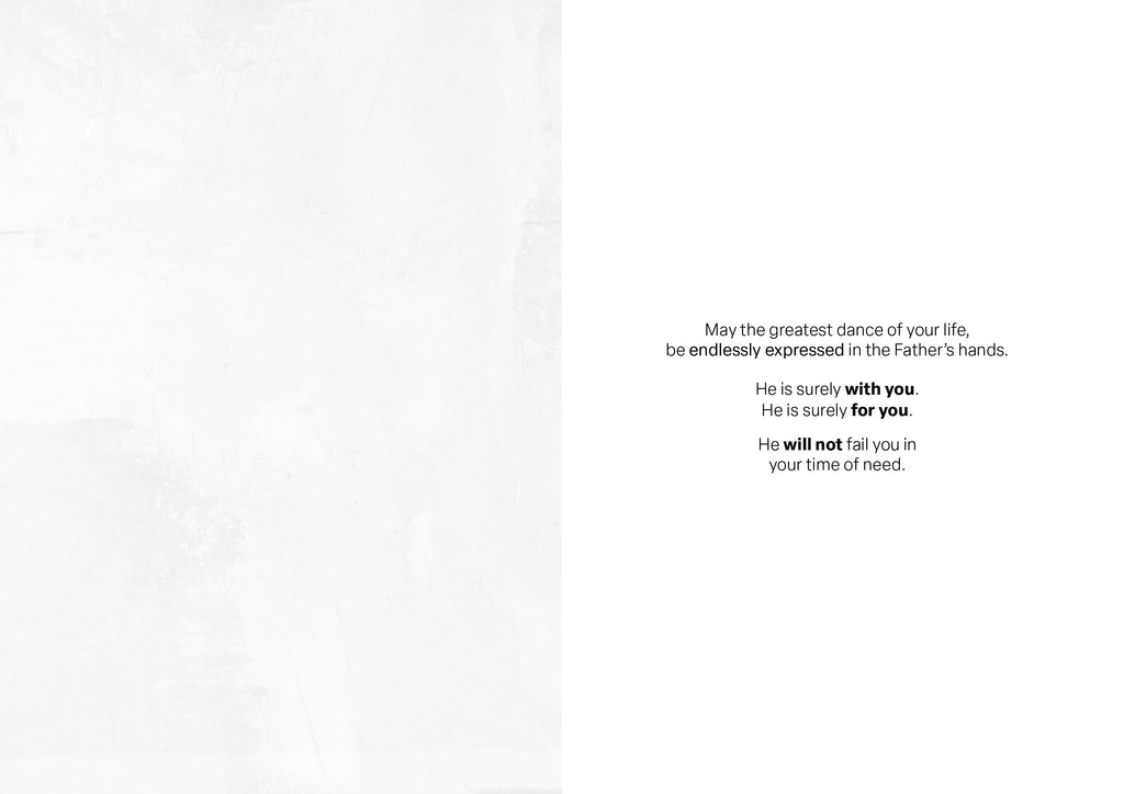 Greeting card back with centered blessing text on light paper.
