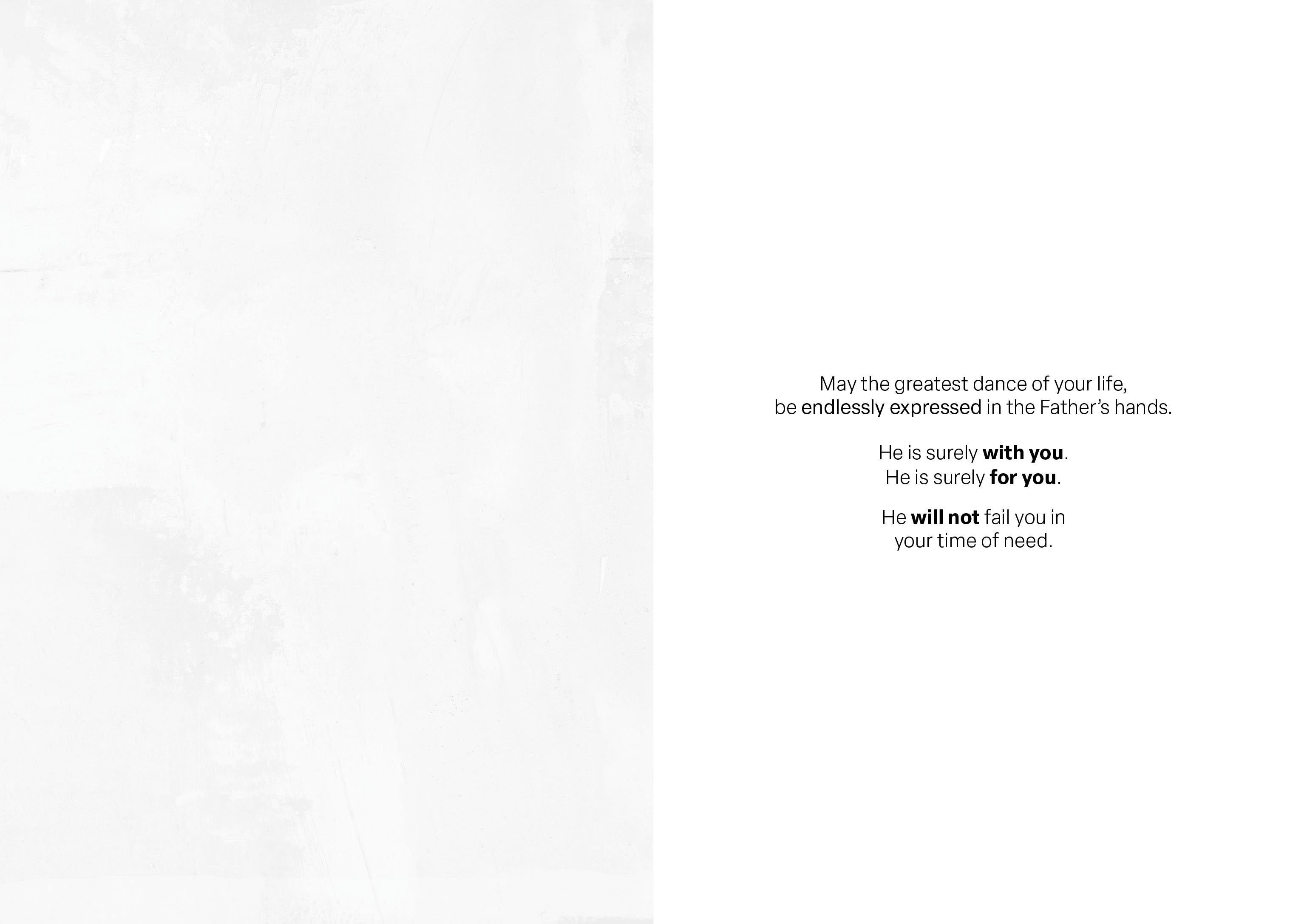 Greeting card back with centered blessing text on light paper.