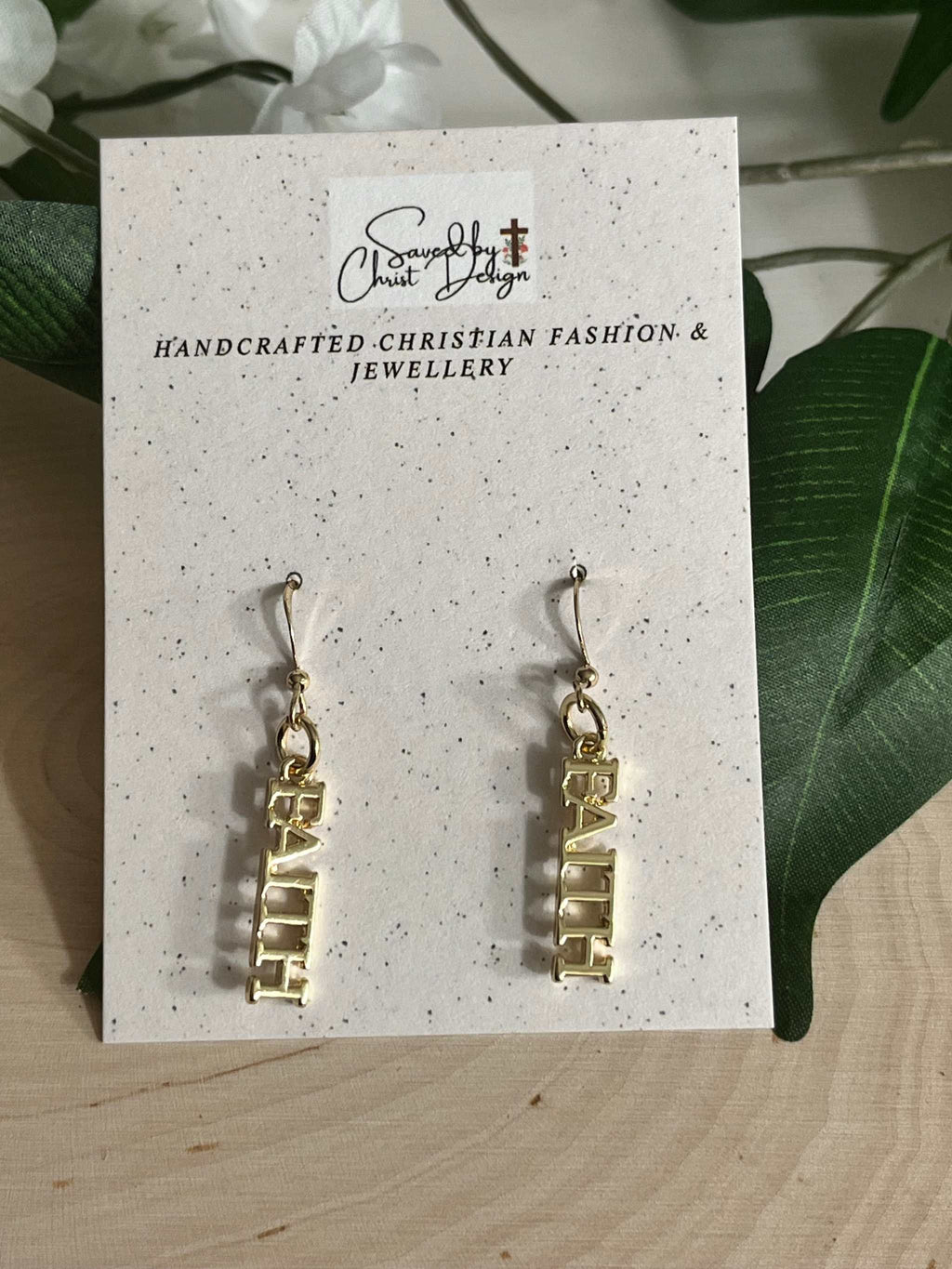 14K gold faith dangle earrings with FAITH block lettering