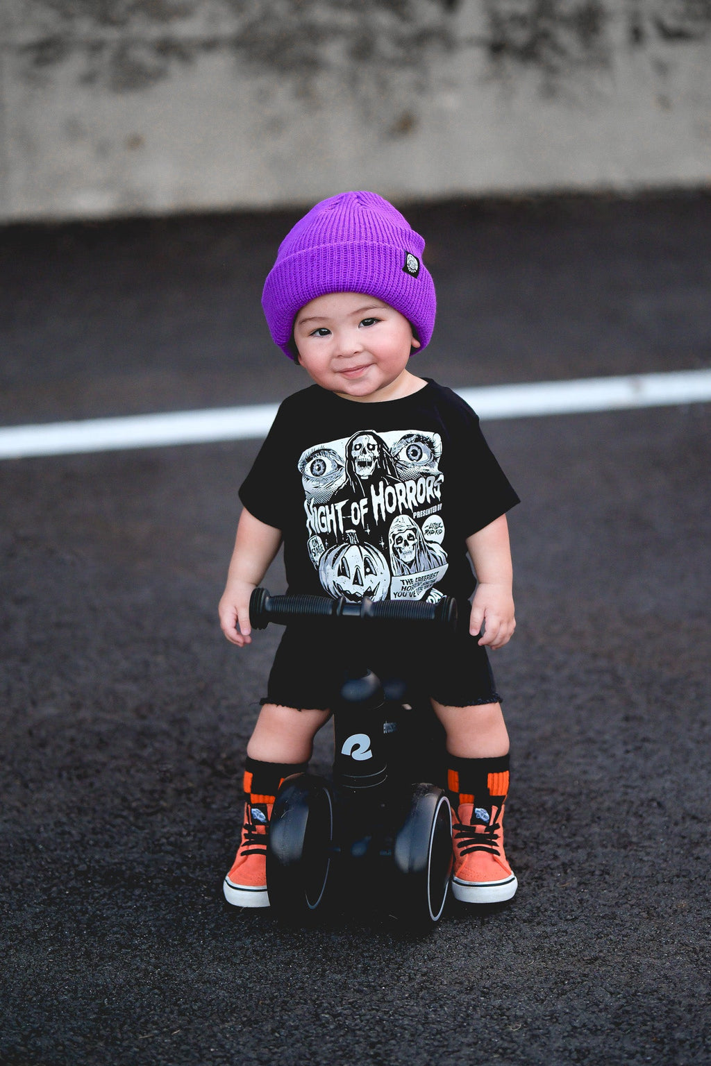 Black kids graphic T-shirt with centered horror illustration and “Friday Oct. 13”