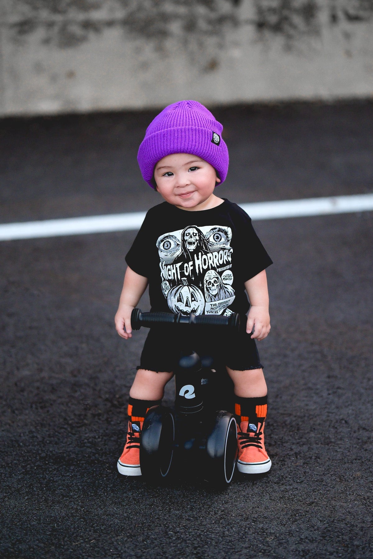 Black kids graphic T-shirt with centered horror illustration and “Friday Oct. 13”