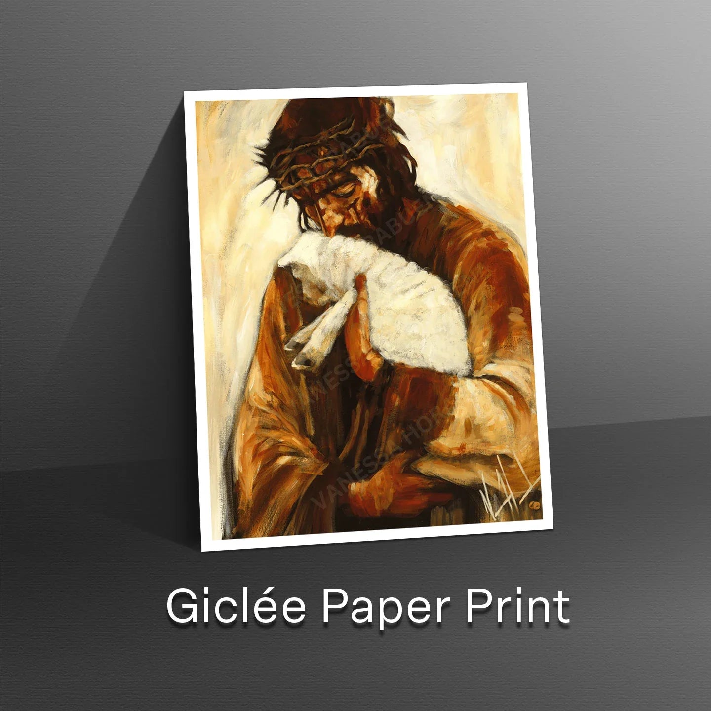 Framed art print of a robed figure embracing a white cloth, warm brown and gold tones