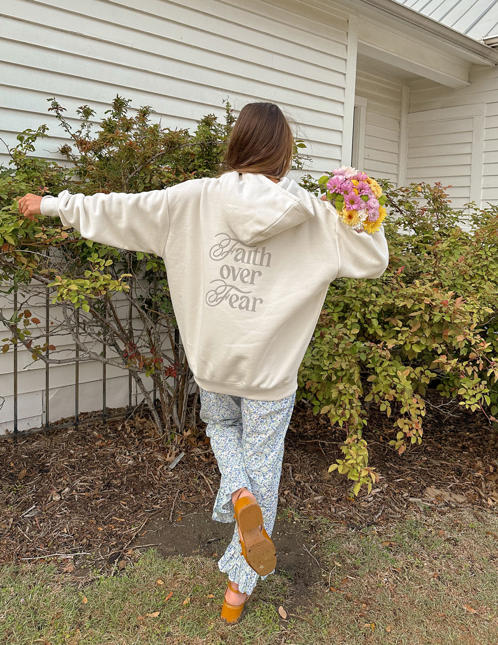 Light hoodie with hood and back 'Faith over Fear' script print