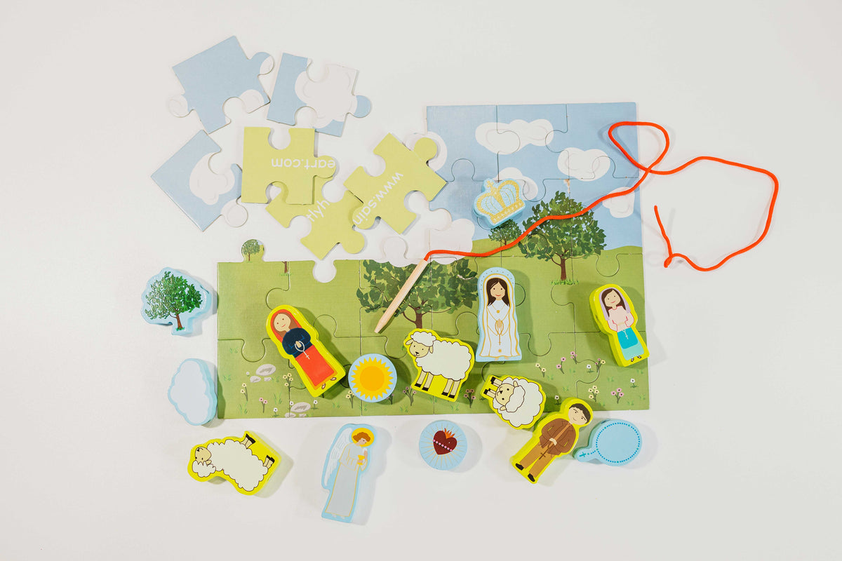 Flat lay of kids' lacing puzzle pieces with red cords and illustrated board