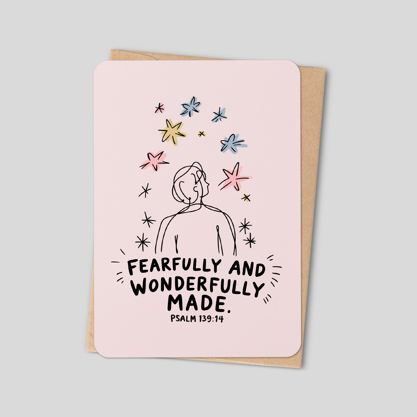 Pink Christian greeting card with angel and stars, “Fearfully and Wonderfully Made” text.