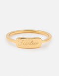 Gold Fearless signet ring with engraved front plaque