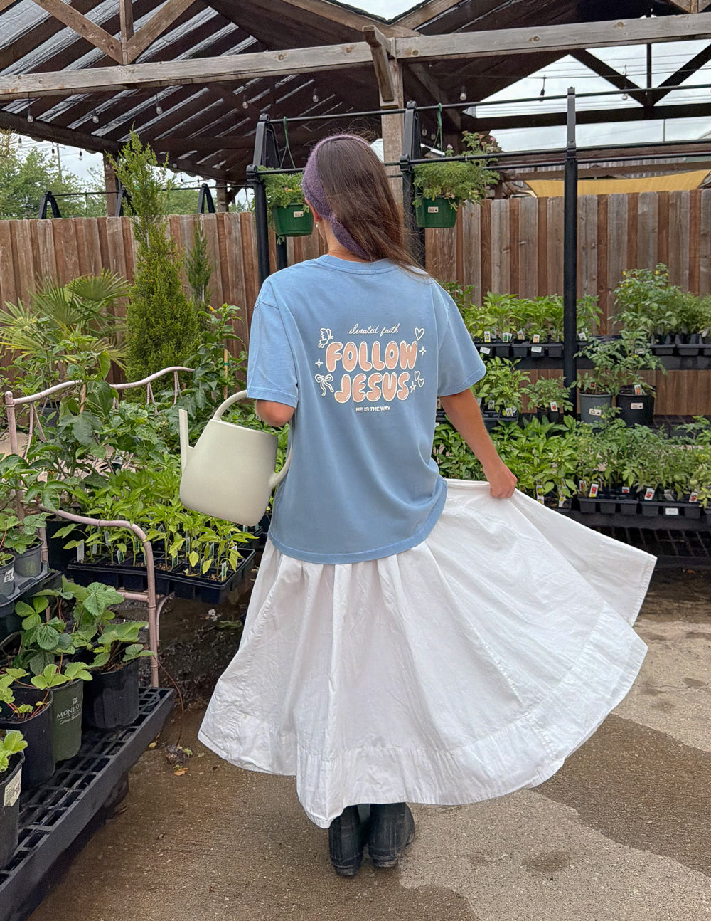 Unisex light blue T-shirt with back "Follow Jesus" graphic and short sleeves