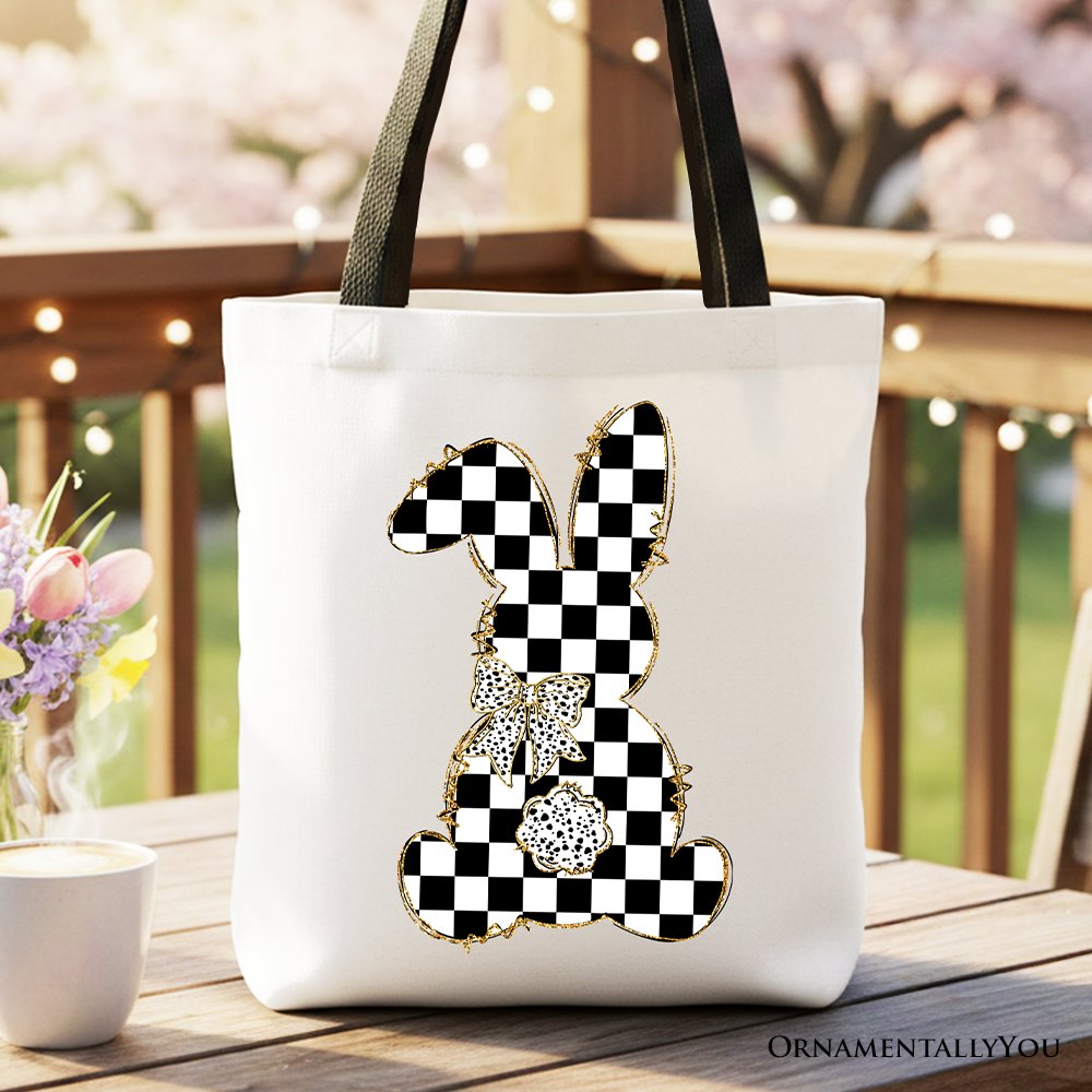 White cotton tote bag with black handles and checkered bunny front appliqué.