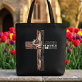 Black tote bag with cross graphic and quote "Loved the world" and John 3:16