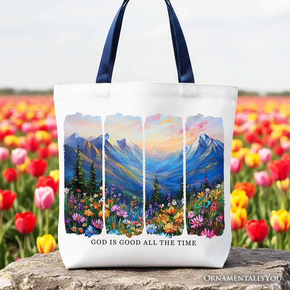 White canvas tote bag with navy handles, mountain landscape bible verse print.