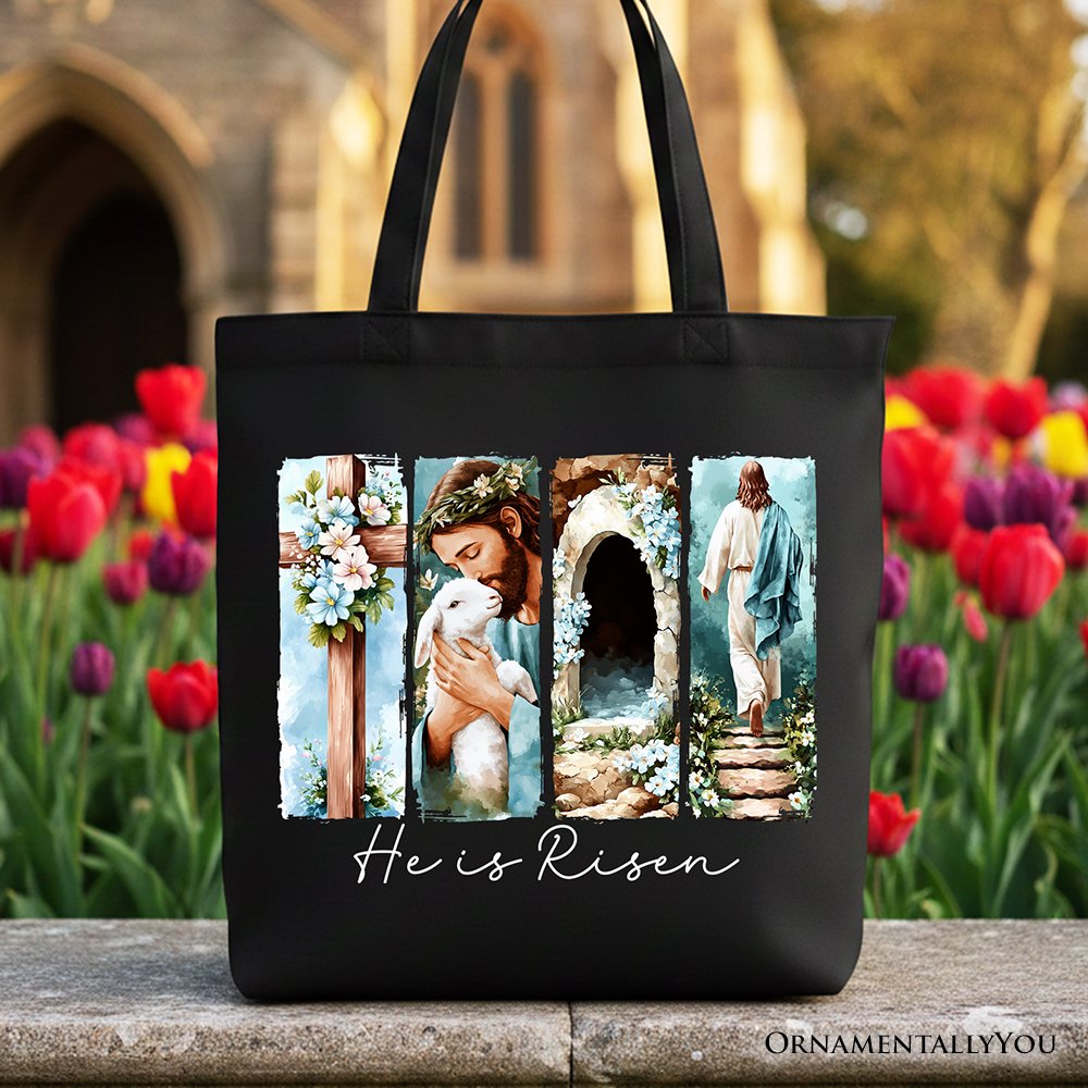 Black canvas tote bag with floral arch collage and "He Is Risen" script on front.