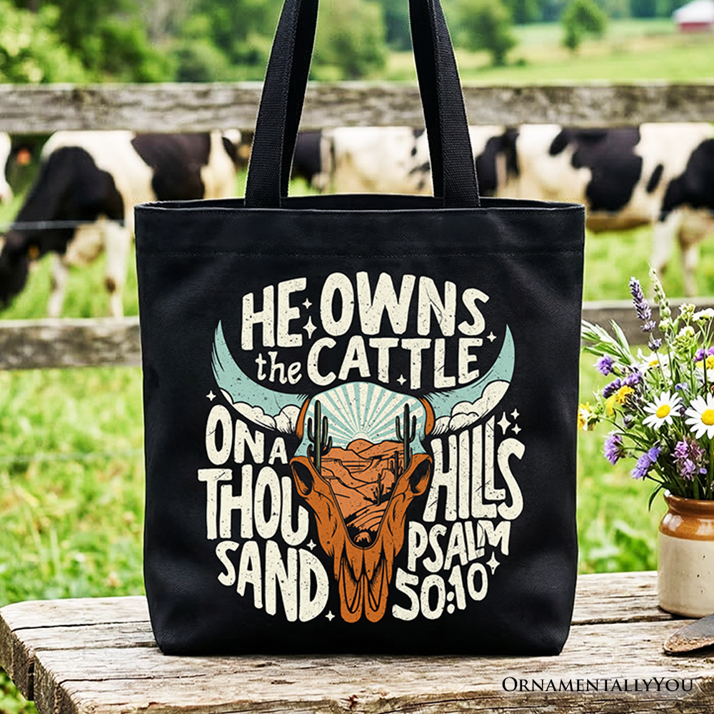 Black tote bag with western faith quote and bull head graphic, top handles