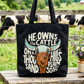 Black tote bag with western faith quote and bull head graphic, top handles