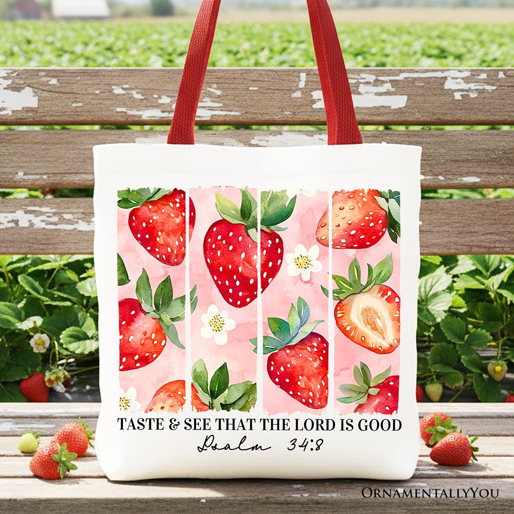 Strawberry print canvas tote bag with red handles and white front panel