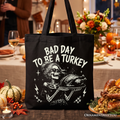 Black cotton tote bag with "Bad Day to Be a Turkey" skeleton graphic