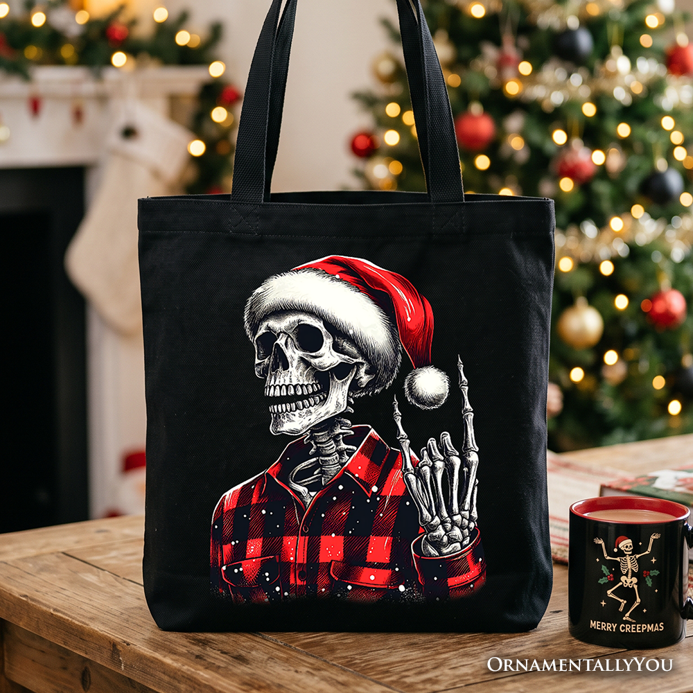 Black tote bag with front skeleton in red santa hat and red plaid shirt graphic