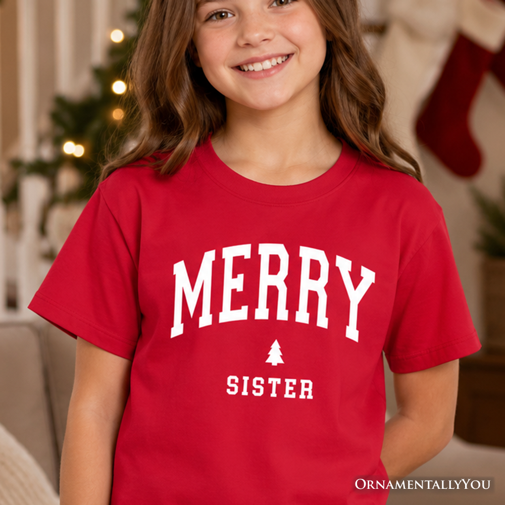 Kids red Christmas T-shirt with “MERRY SISTER” text and small tree graphic