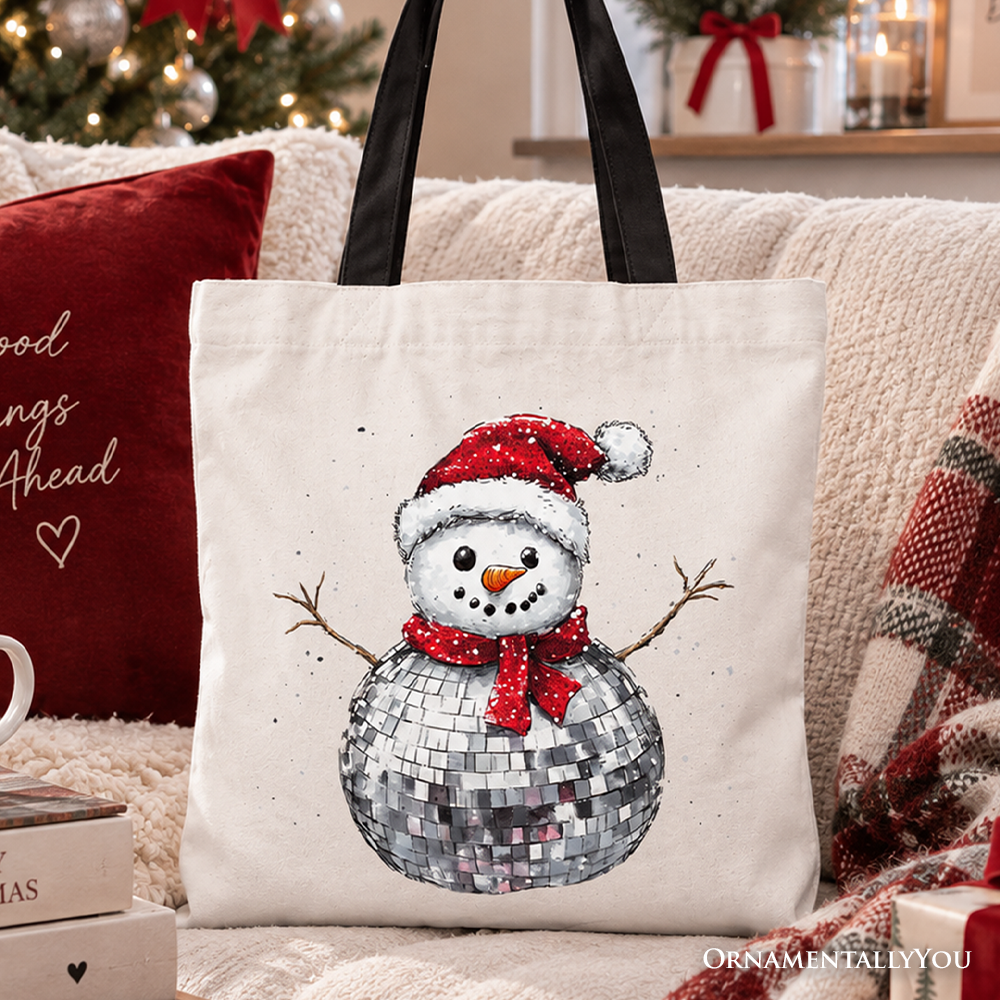 White tote bag with red-and-silver snowman disco graphic and black handles