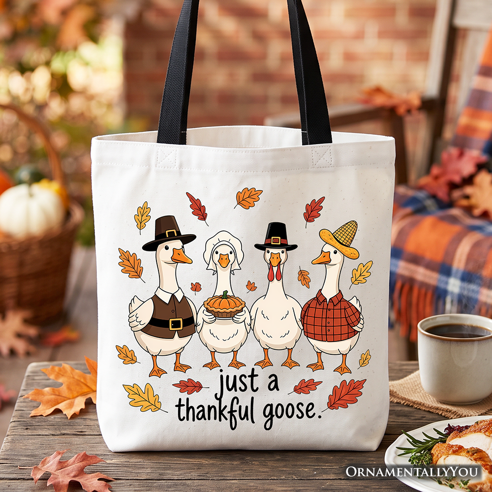 White cotton tote bag with black handles and Thanksgiving turkey cartoon graphic