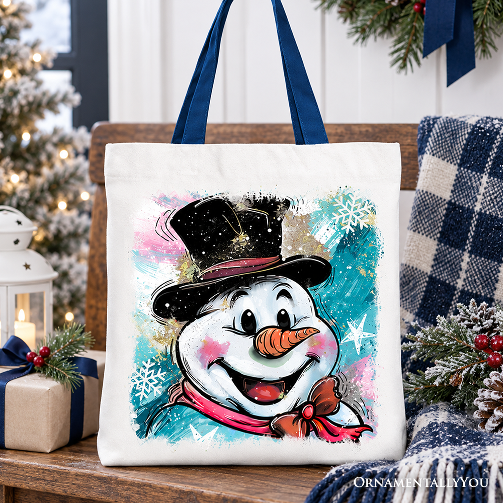 White cotton tote bag with navy handles, cute snowman graphic in glittery winter colors
