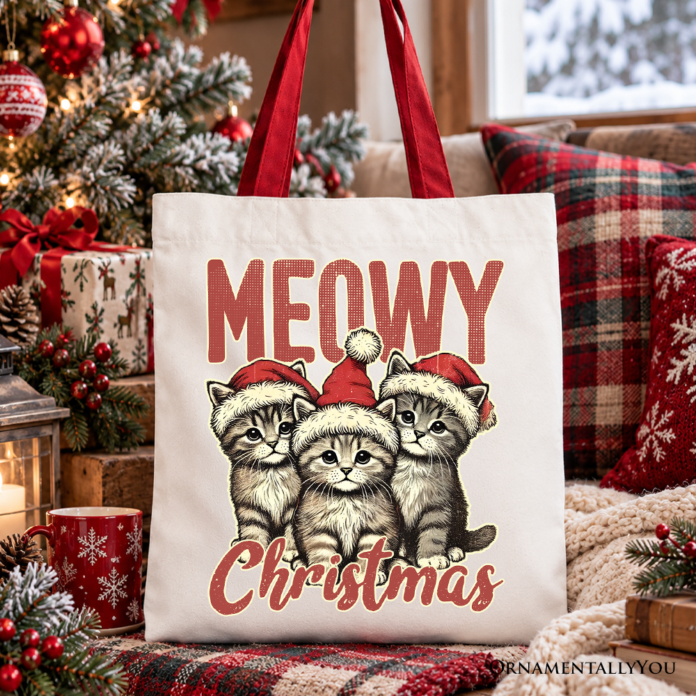 White cotton tote bag with “MEOWY Christmas” cat print, red handles