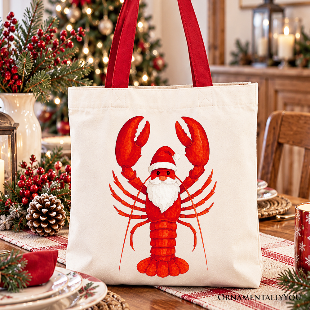 White cotton tote bag with red-handled straps and red lobster Santa front print