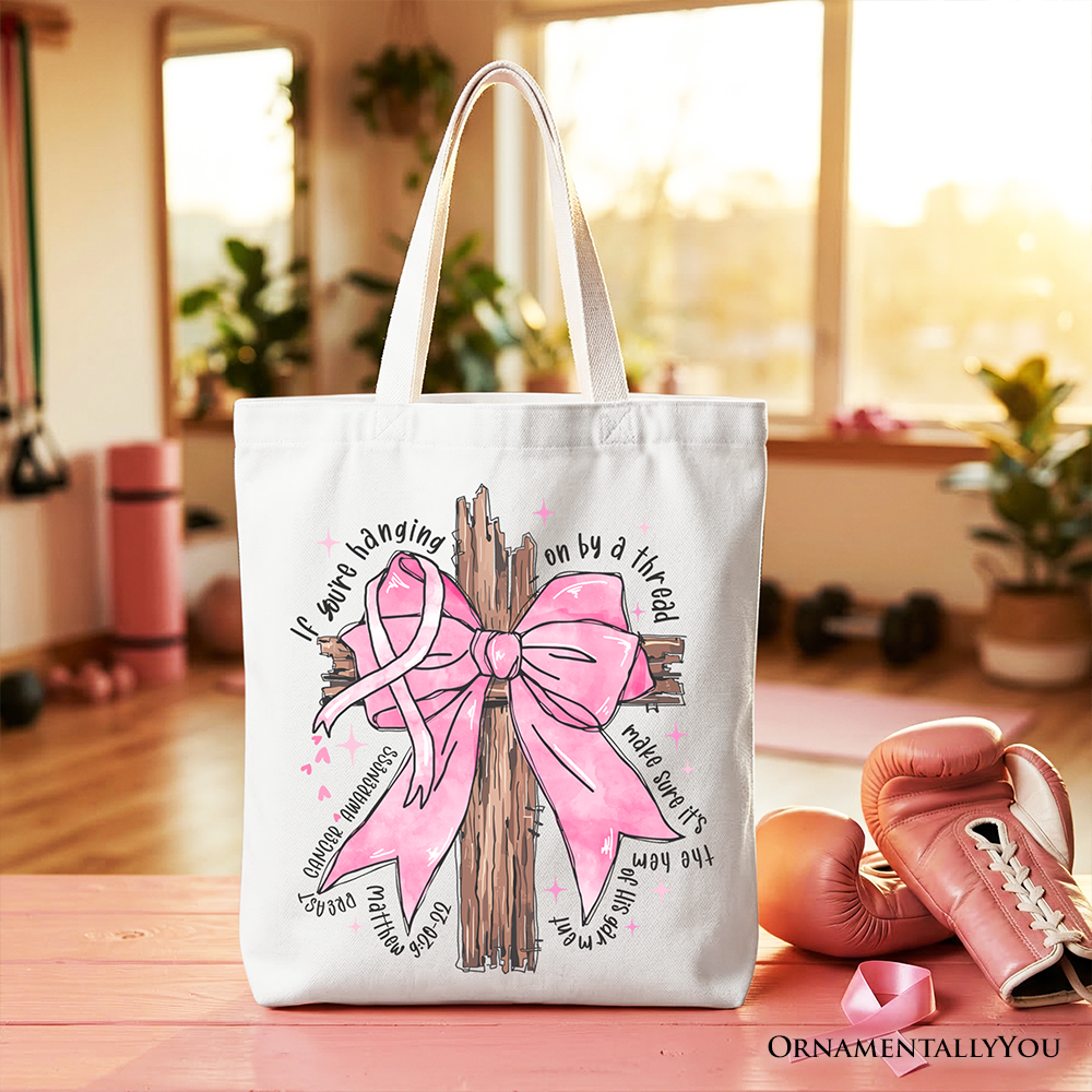 White tote bag with pink bow tree graphic and pink accents, standing upright.