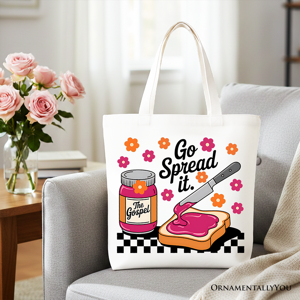 White tote bag with beige handles and colorful 'Go Spread It' religious print