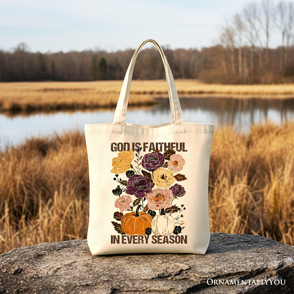 White cotton tote bag with autumn floral bouquet and 'God is faithful in every season' text