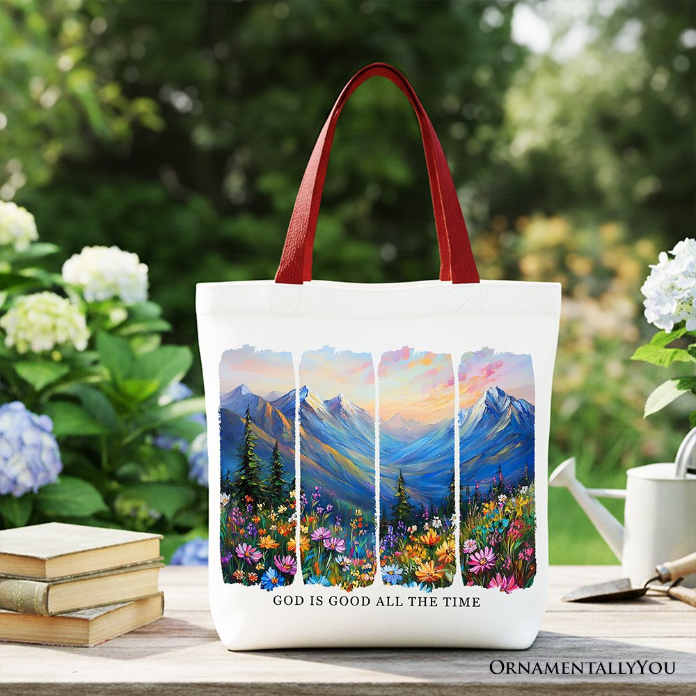White canvas tote bag with red handles, mountain landscape bible verse print.