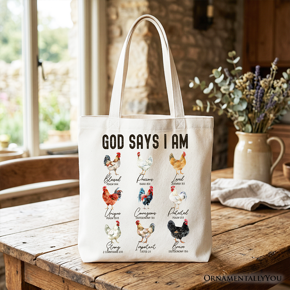 White tote bag on a table, showing bold black text and rooster/chicken illustration