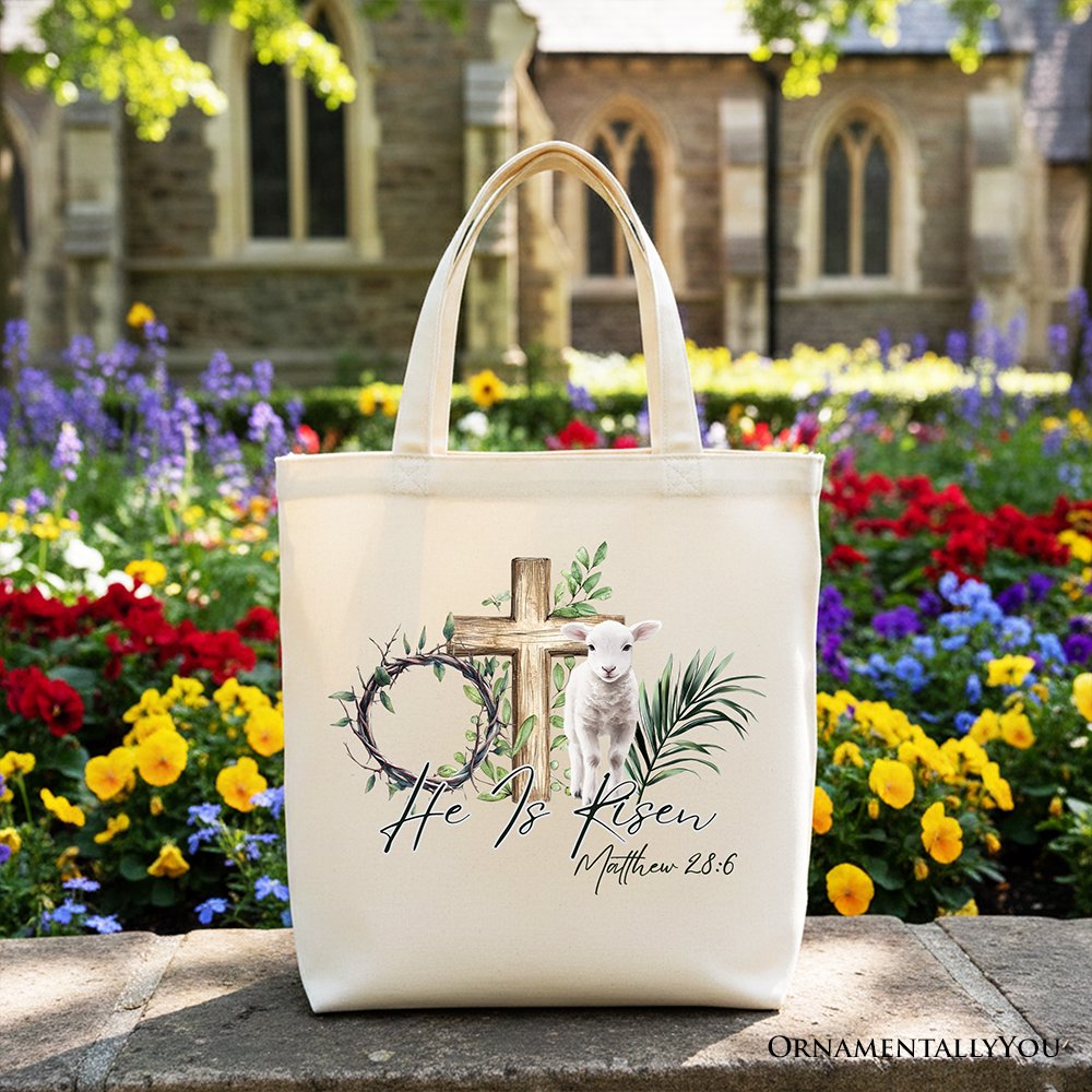 Cream Christian Easter tote bag with cross, lamb, and Matthew 28:6 verse print